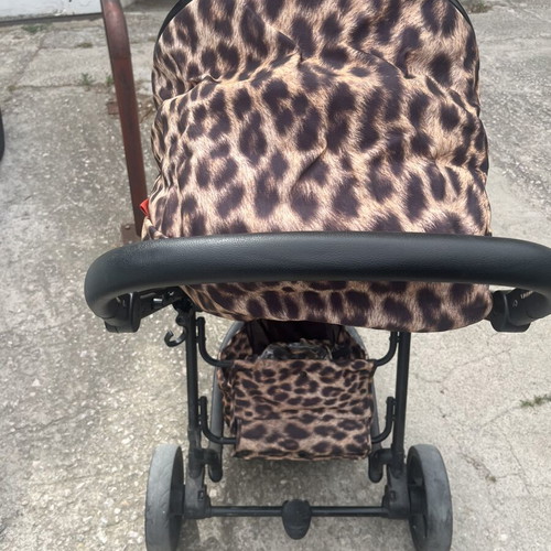 Cossato Leopard Stroller used with bassinet and accessories