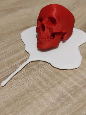 Red skull melting