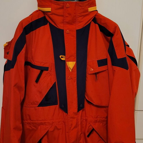 Ski and mountaineering jacket like new, red with blue details, medium