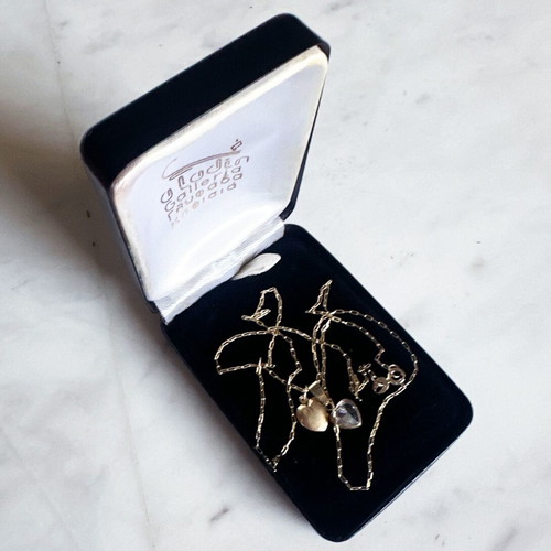 Vintage 14K gold necklace with two hearts