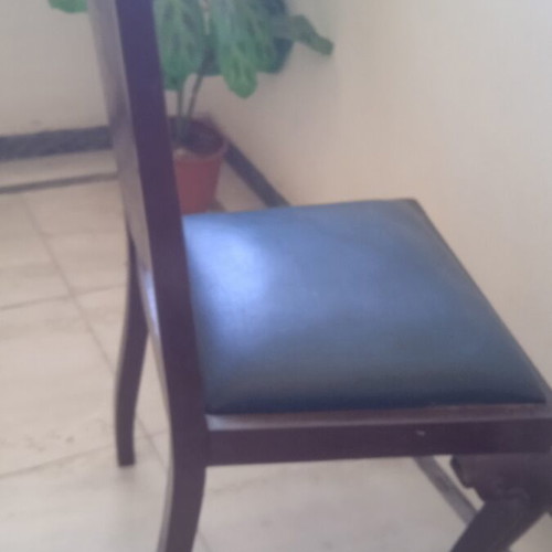 Antique chair used with lion's paw legs needing repair