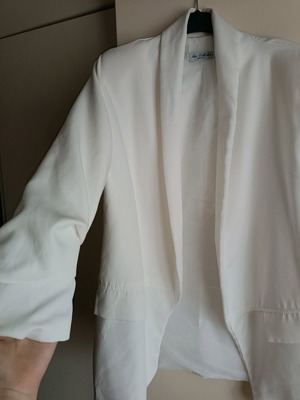 White jacket used with gathers on sleeves, size L