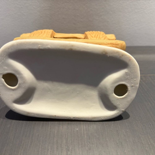 Porcelain decoration with two children on bench like new