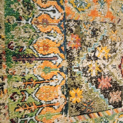 Colorful oriental style rug with distressed look like new