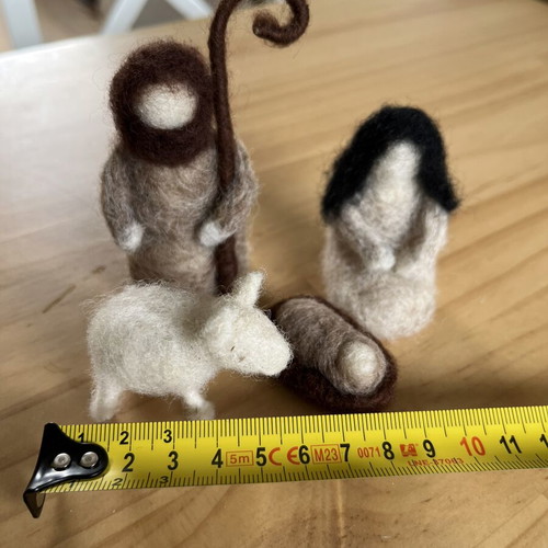Woolen nativity scene with Mary, Joseph, baby Jesus and lamb