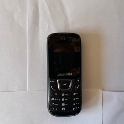 Samsung E1280 used black phone without charger and battery