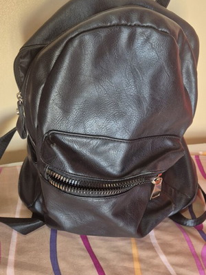 Backpack large black leather like new with gold details