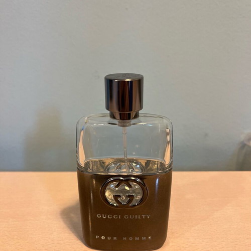 Gucci Guilty Pour Homme cologne bottle used, empty