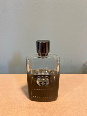 Gucci Guilty Pour Homme cologne bottle used, empty