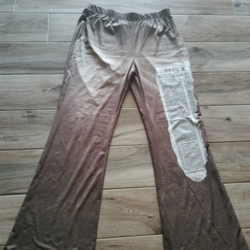 Elastic bell-bottom pants with front print, like new, size XL