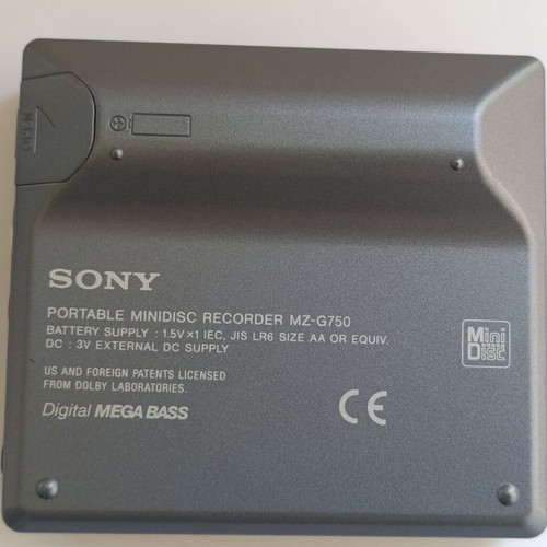 Sony MD Walkman MZ-G750 with remote, 5 discs, power supply, and battery