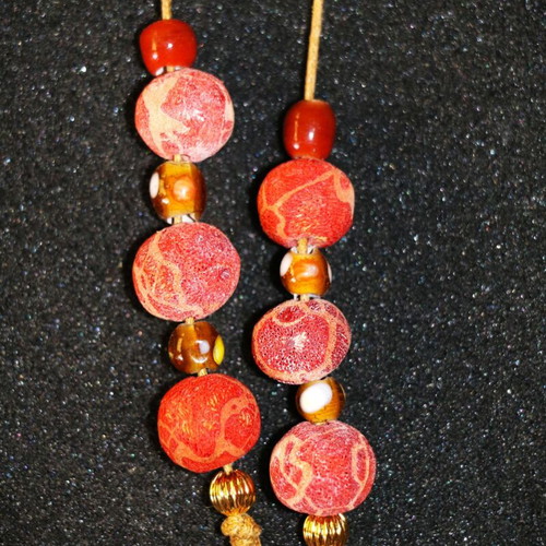 Begleri with genuine coral and 22K gold-plated beads, handmade by Indico Jewells