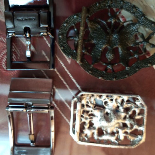 Four belt buckles