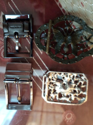 Four belt buckles