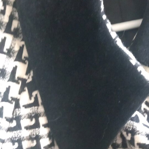 Checked coat with velvet collar, like new, size L