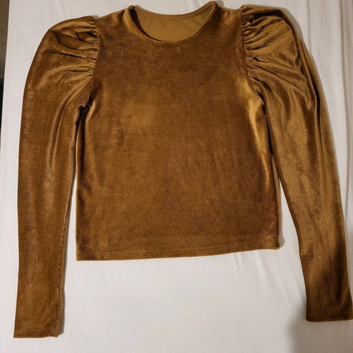 Gold blouse medium used with distinctive shoulders