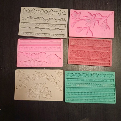 Silicone molds like new, 75 pieces for clay and porcelain