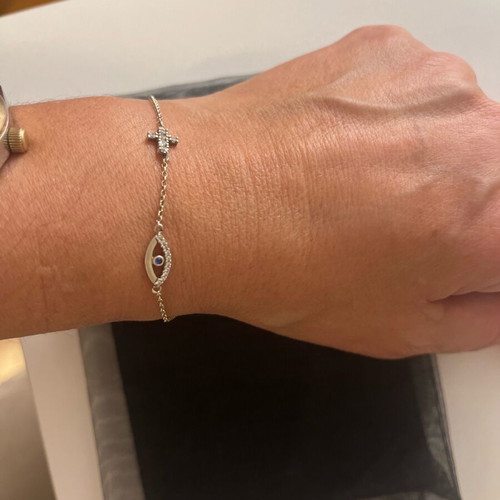 Silver delicate bracelet with cross and eye like new