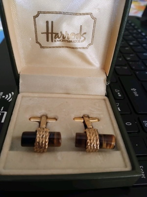 Cufflinks with tiger's eye like new, gold color from Harrods London