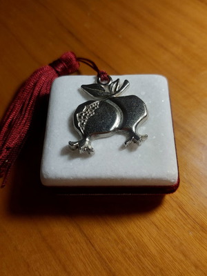 Marble paperweight with metal pomegranate and tassel like new