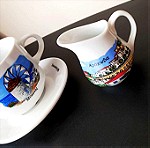  Φλυτζάνι του καφέ και γαλατιέρα με τουριστικά μοτίβα