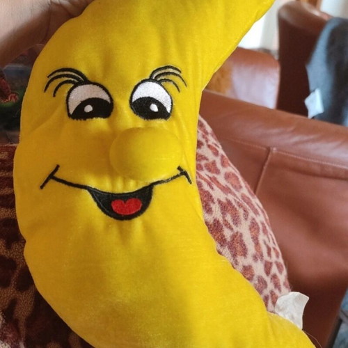 Crescent moon stuffed toy used with big smile