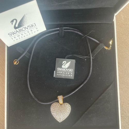 Swarovski necklace with heart pendant like new, white stones