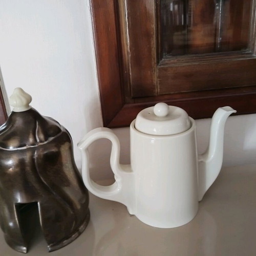 Vintage teapot used, ceramic porcelain with metal silver-plated holder