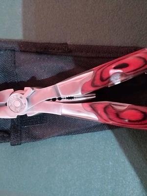 Multipurpose tool new with cutter pliers and case