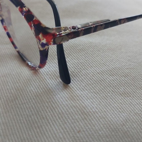 Italian children's eyeglasses with colorful tortoiseshell frame and metal temples