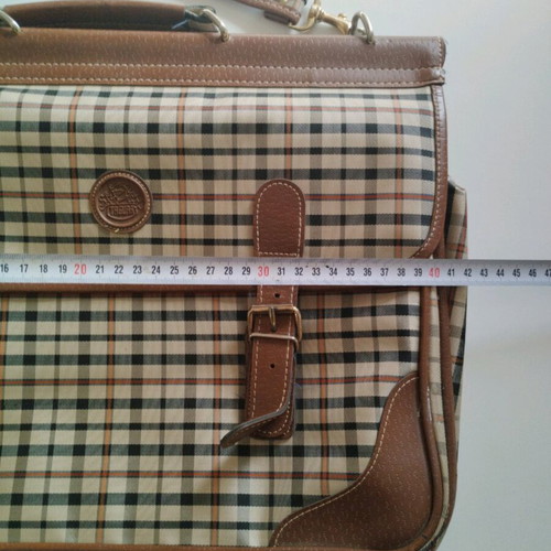 Vintage briefcase like new with small internal stain