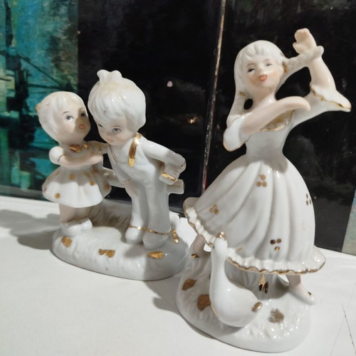 Porcelain figurines set used, young girl with goose and children