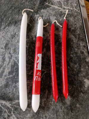 Set of 4 new candles, 2 red, 1 white, 1 white-red with bunny