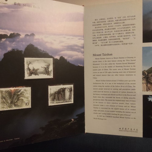 Collectible gold-bound volume with China stamps and photos