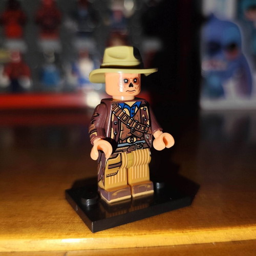The Ghoul minifigure like new with stand and beige hat