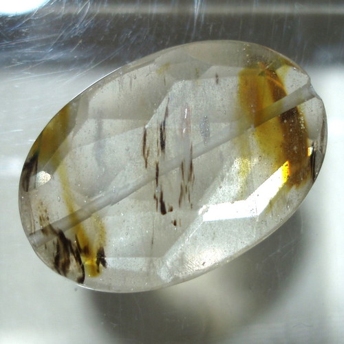 Mineral quartz with oxide inclusions like new