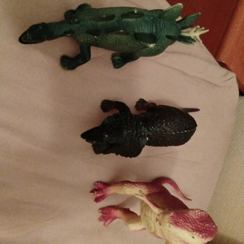 Dinosaur figures like new with sound valve in belly