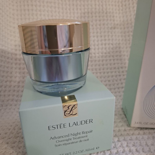Estée Lauder cosmetic jars with Micro Essence lotion used set