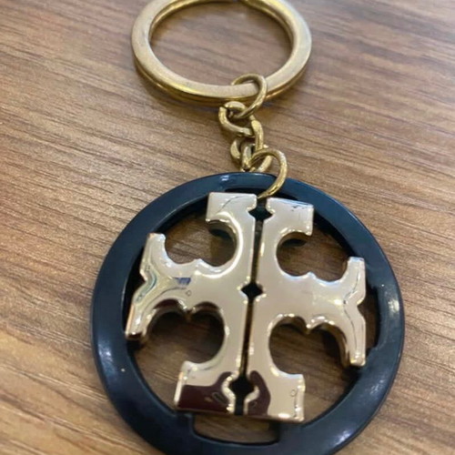 Tory Burch keychain like new, black and gold