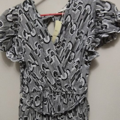 Jumpsuit M/L black and white with ruffle sleeves and belt