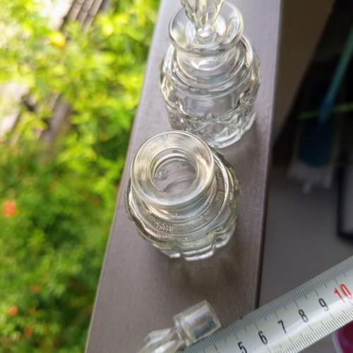 Vintage glass miniature bottle set of 2 with carved pattern and glass stopper