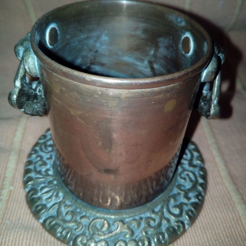 Copper cup used with embossed bronze base and handles