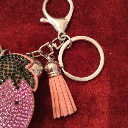 Strawberry Charm like new, pink and silver keychain accessory