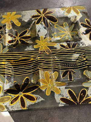 Glass platter with leaves used for nuts