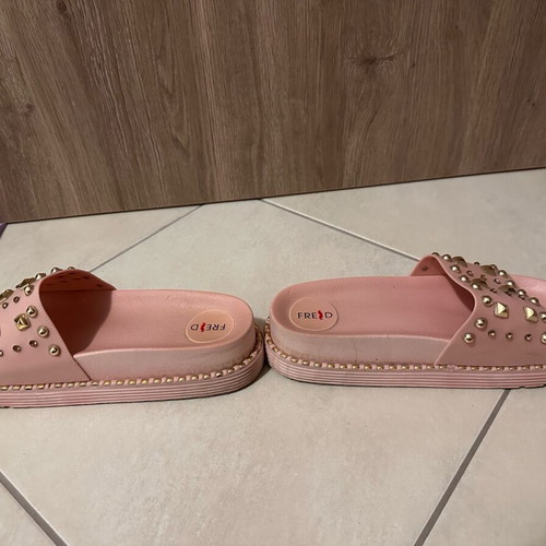 Keep Fred pink soft slippers like new with gold studs