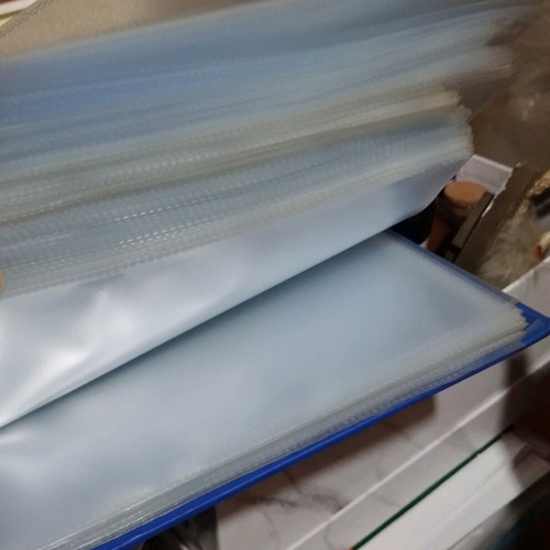 Plastic sleeves for A4 like new, 190 pieces with binder