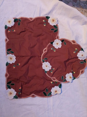Embroidered table linens used, brown set