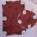 Embroidered table linens used, brown set