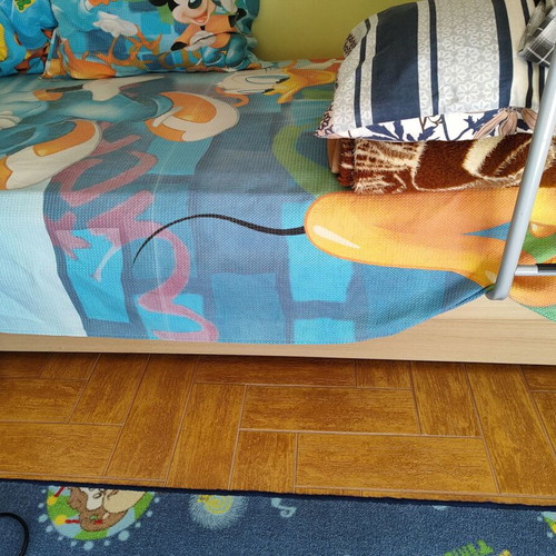 Bunk bed with three mattresses used, includes desk and drawers