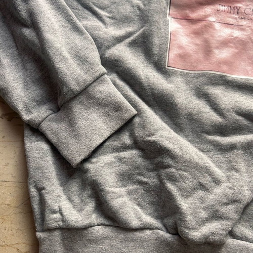 Women's gray sweatshirt like new, size large with shoe print